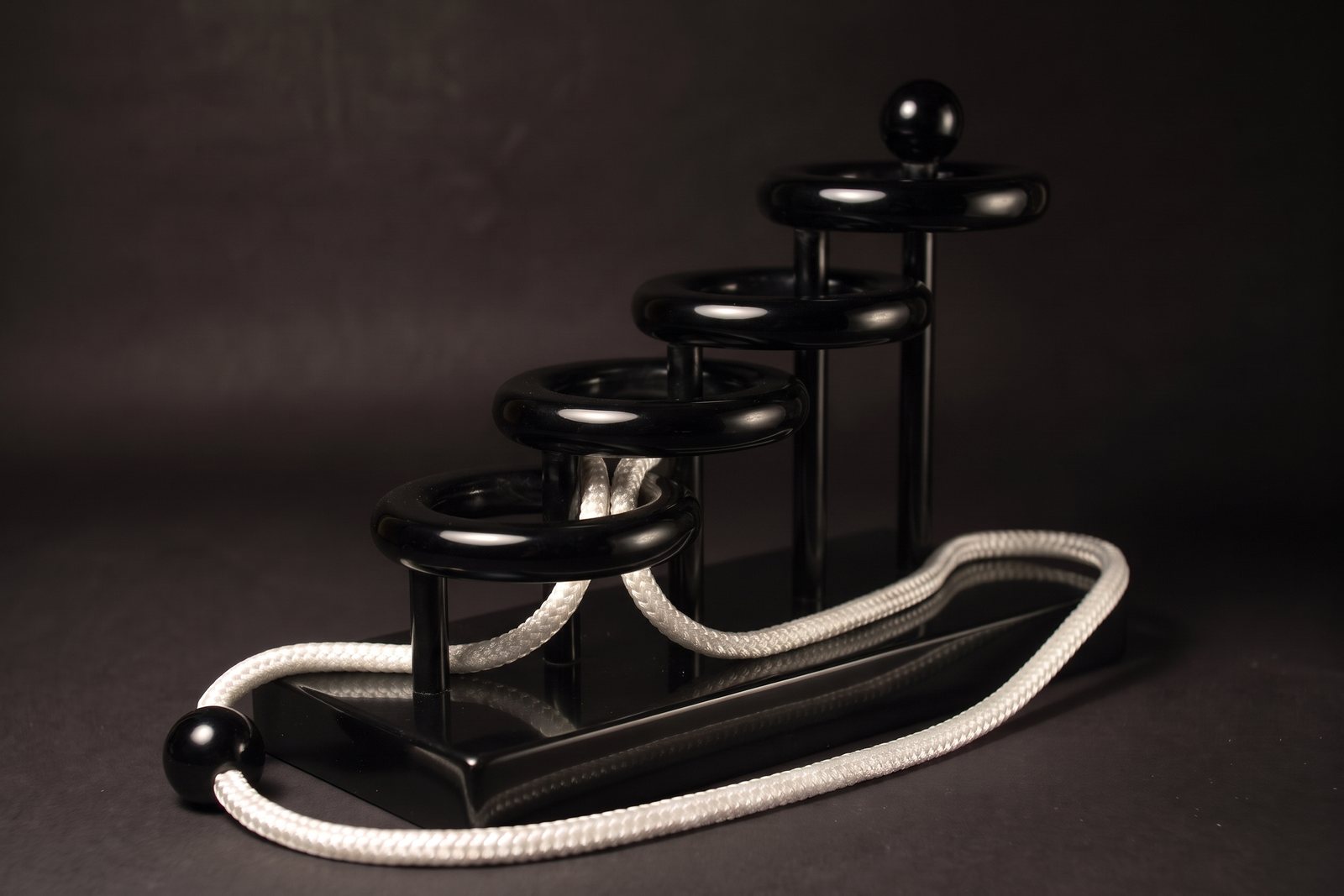 Four Infinities in black onyx