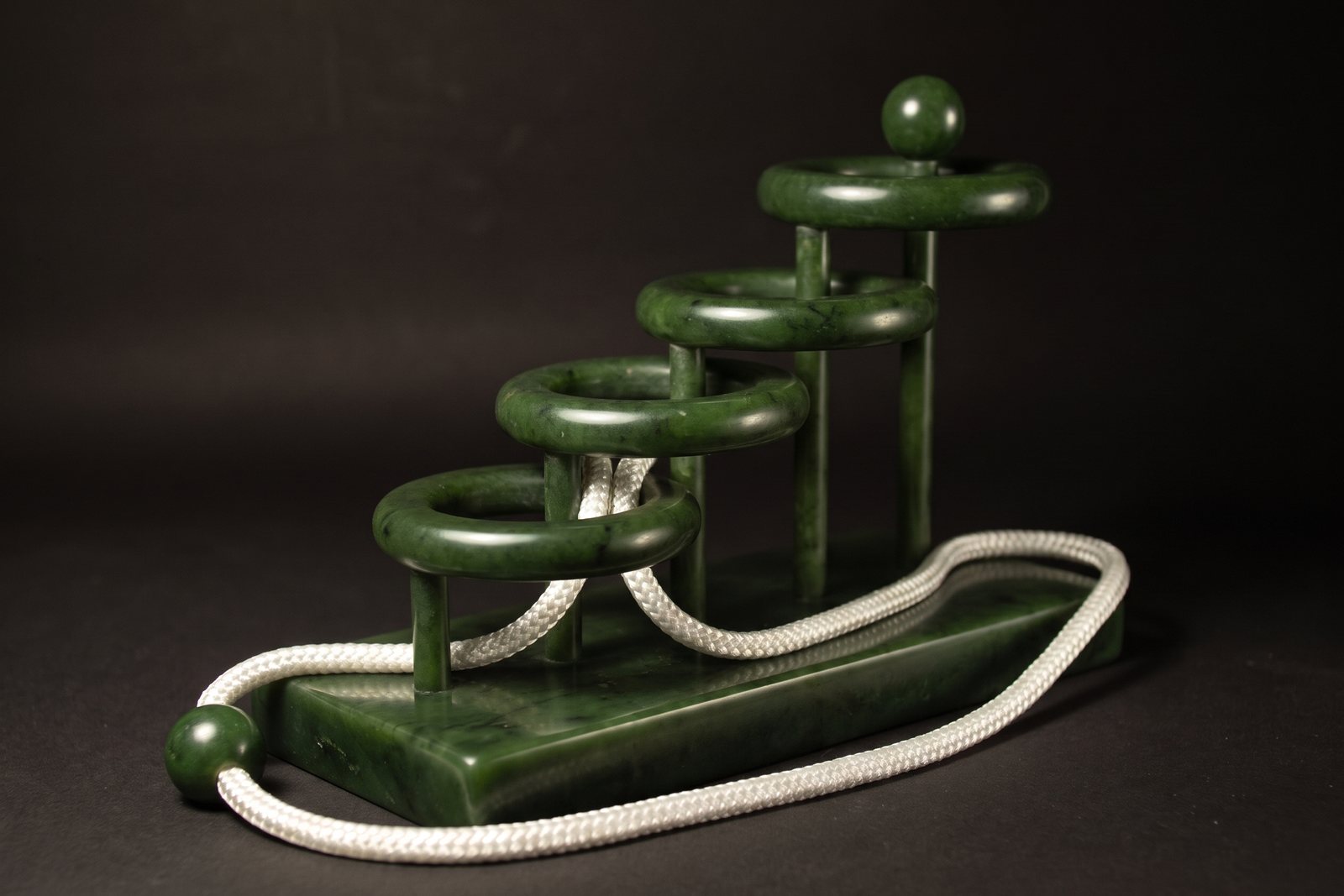 Four Infinities in nephrite jade
