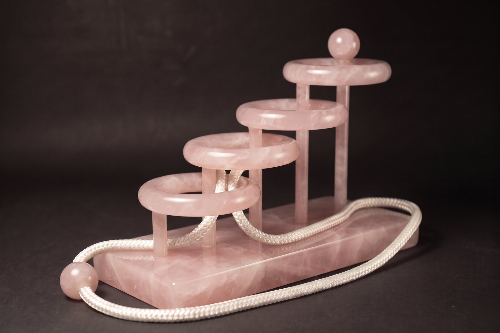 Four Infinities in rose quartz